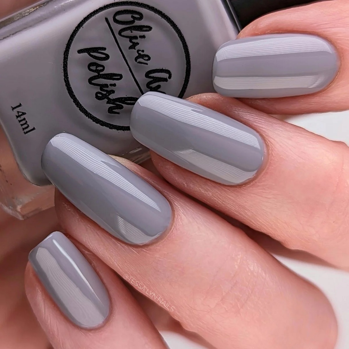 Nails are a pale grey color